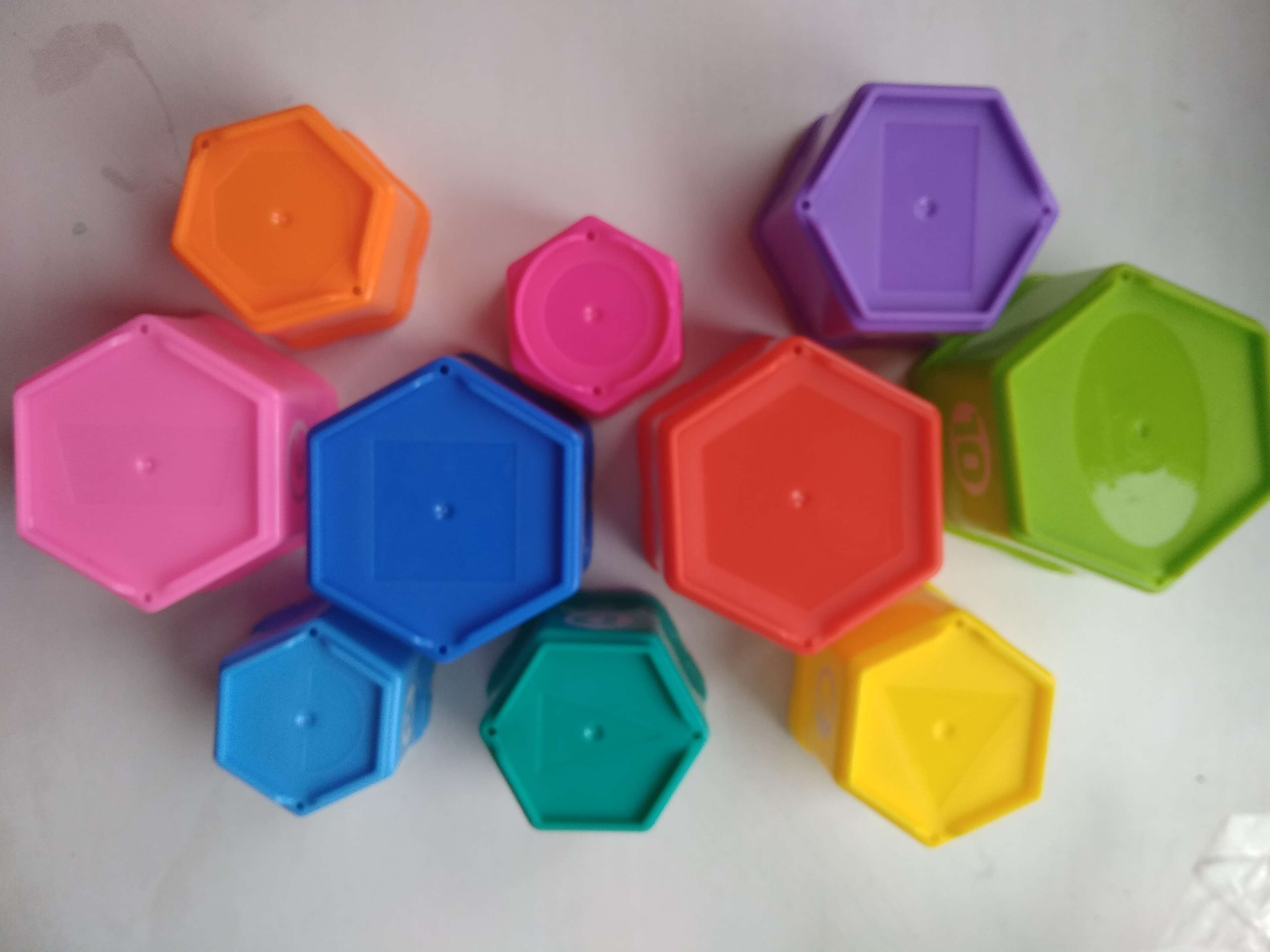 Фотография покупателя товара Развивающая игрушка «Пирамидка: Мишка», стаканчики с буквами и цифрами, 11 предметов - Фото 2