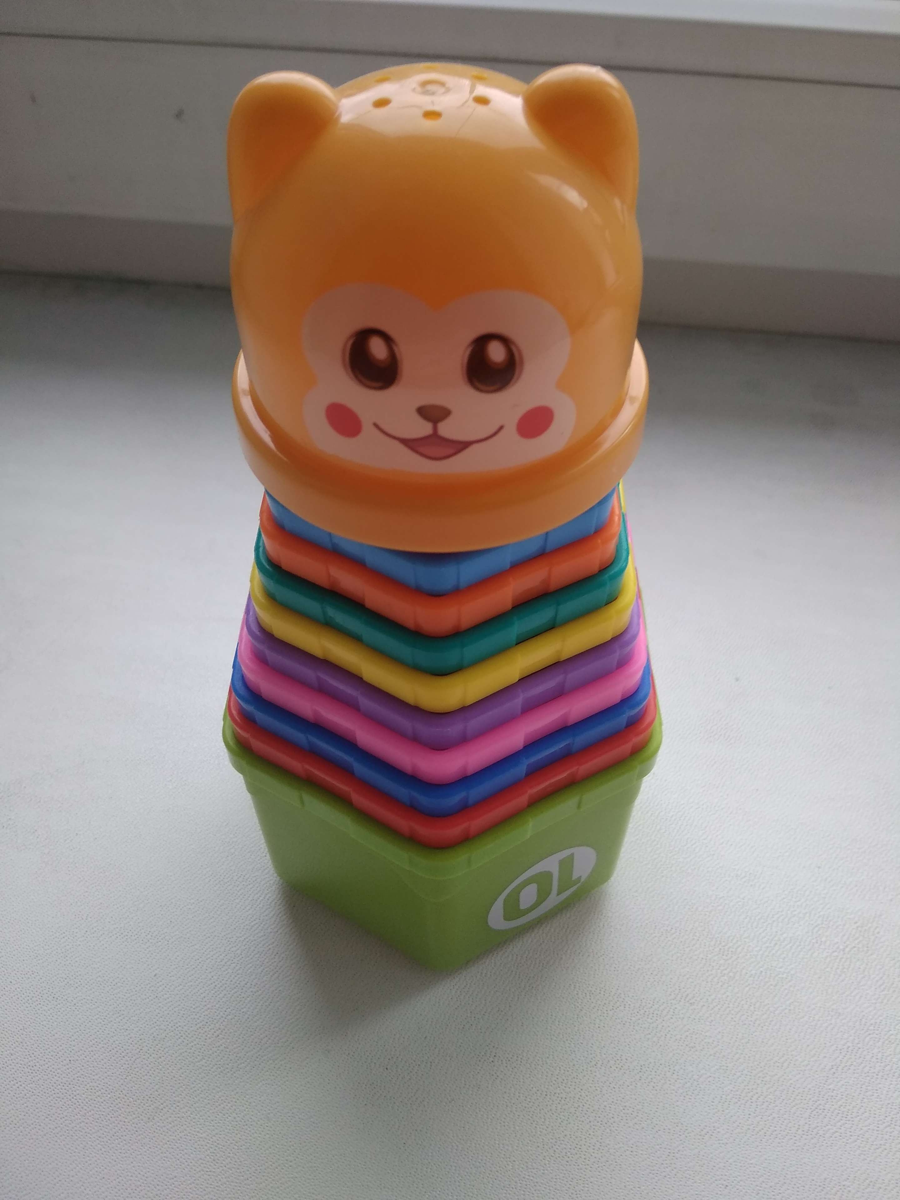 Фотография покупателя товара Развивающая игрушка «Пирамидка: Мишка», стаканчики с буквами и цифрами, 11 предметов - Фото 3