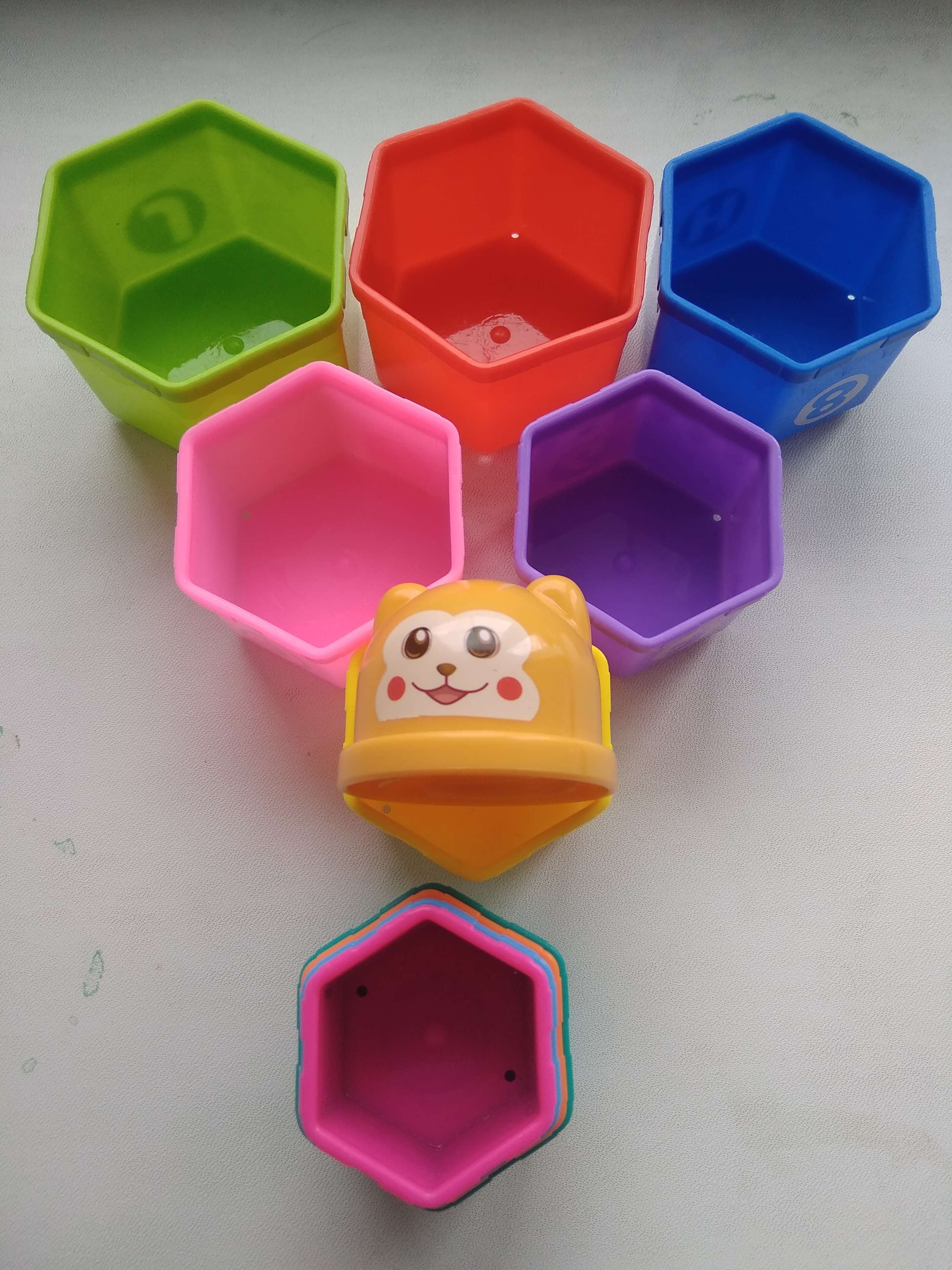 Фотография покупателя товара Развивающая игрушка «Пирамидка: Мишка», стаканчики с буквами и цифрами, 11 предметов - Фото 7