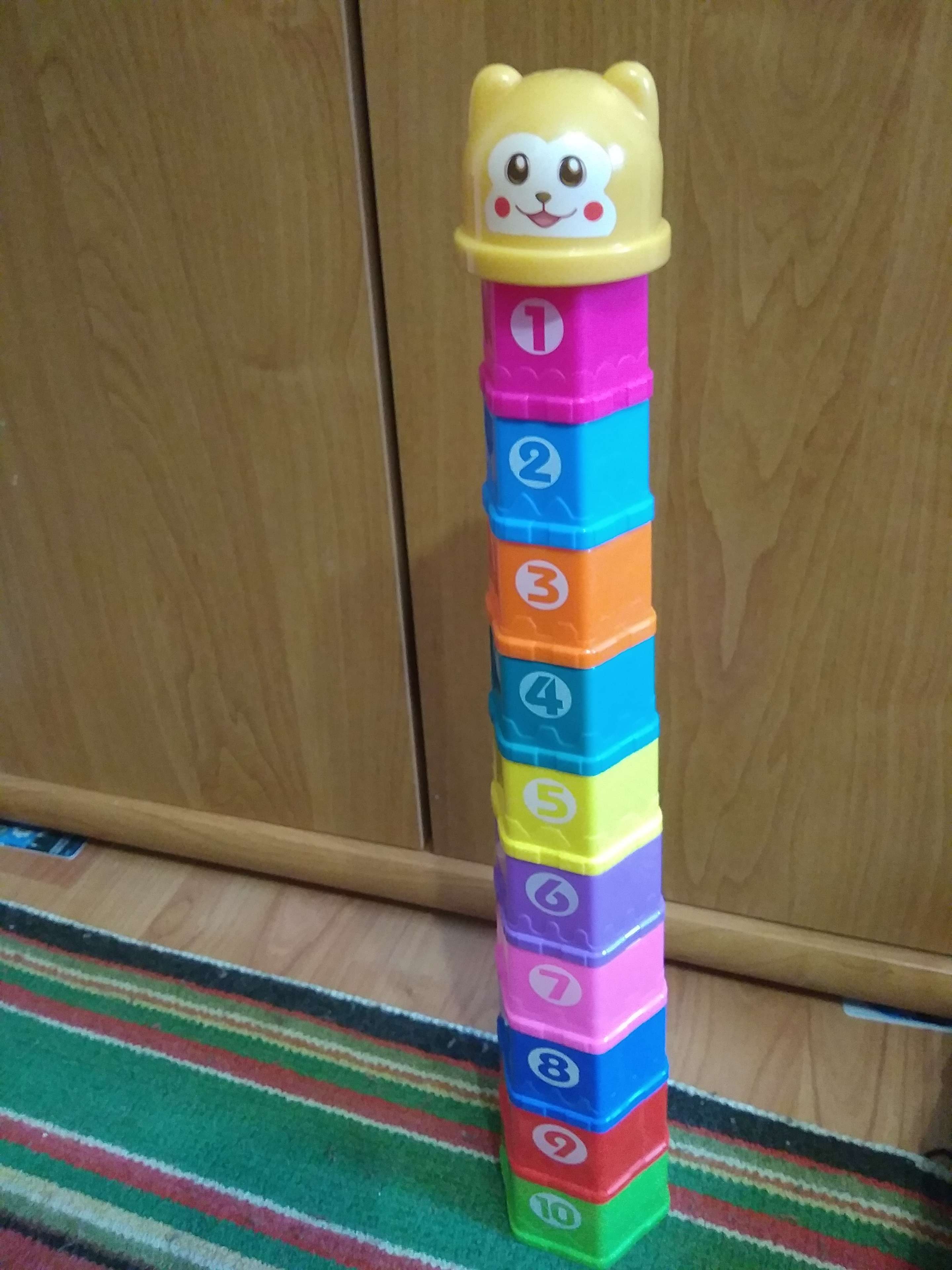 Фотография покупателя товара Развивающая игрушка «Пирамидка: Мишка», стаканчики с буквами и цифрами, 11 предметов - Фото 6
