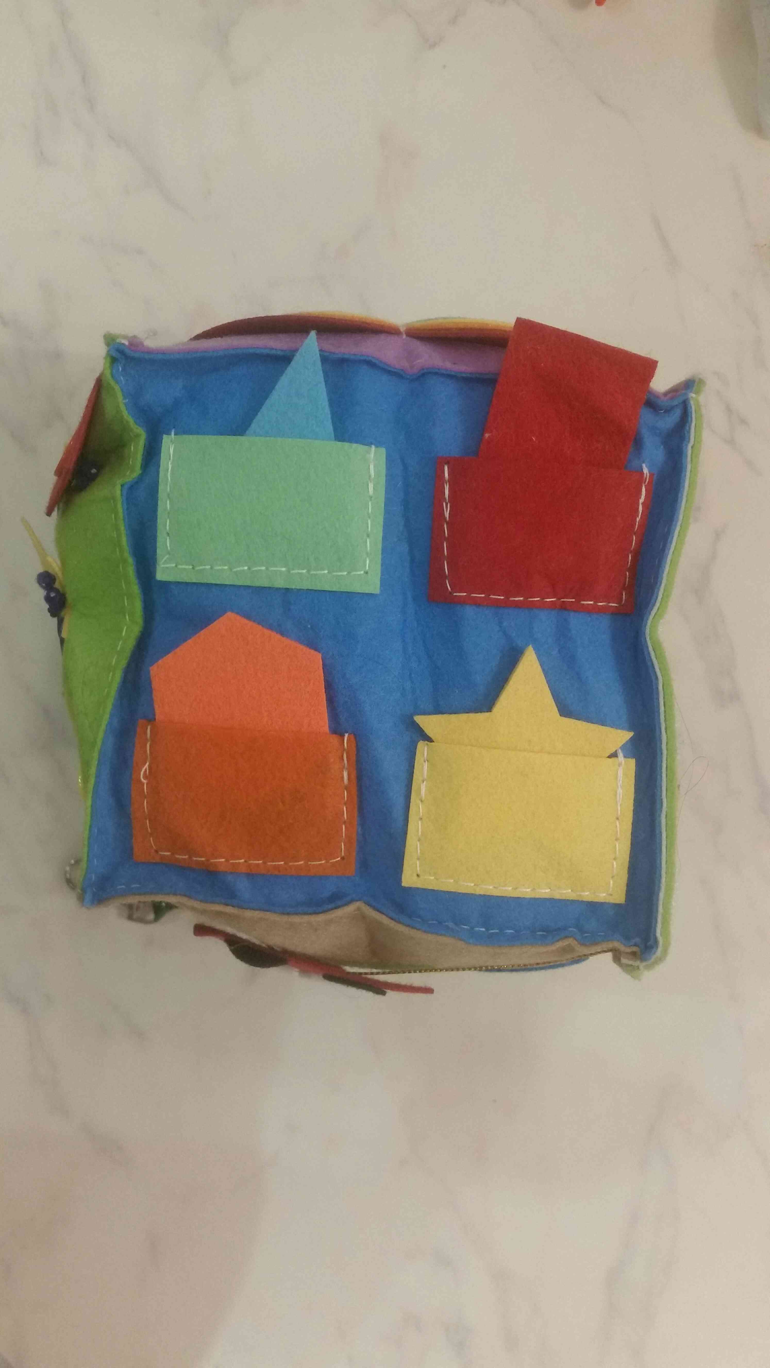 Фотография покупателя товара Мягкий бизикубик «Изучаем цвета и формы» текстильный, 15×15 см - Фото 1