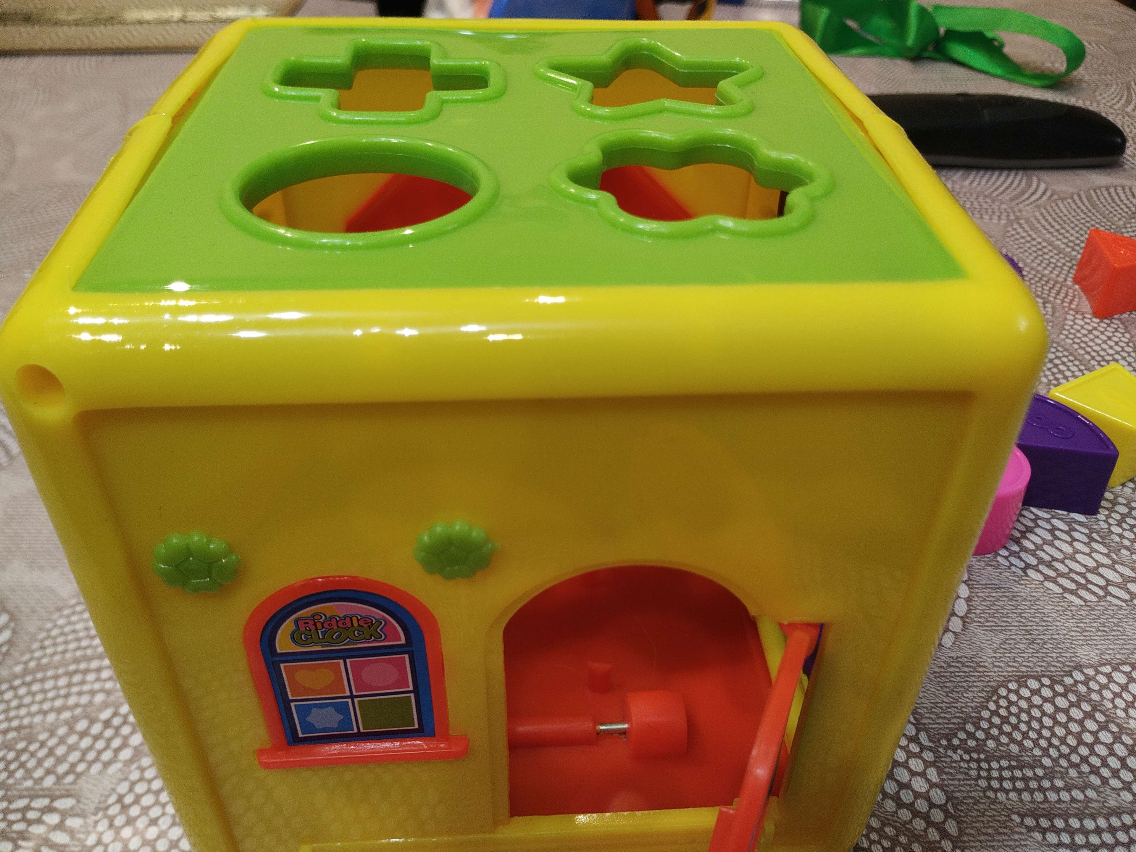 Фотография покупателя товара Развивающая игрушка сортер-каталка «Домик», цвета МИКС - Фото 7