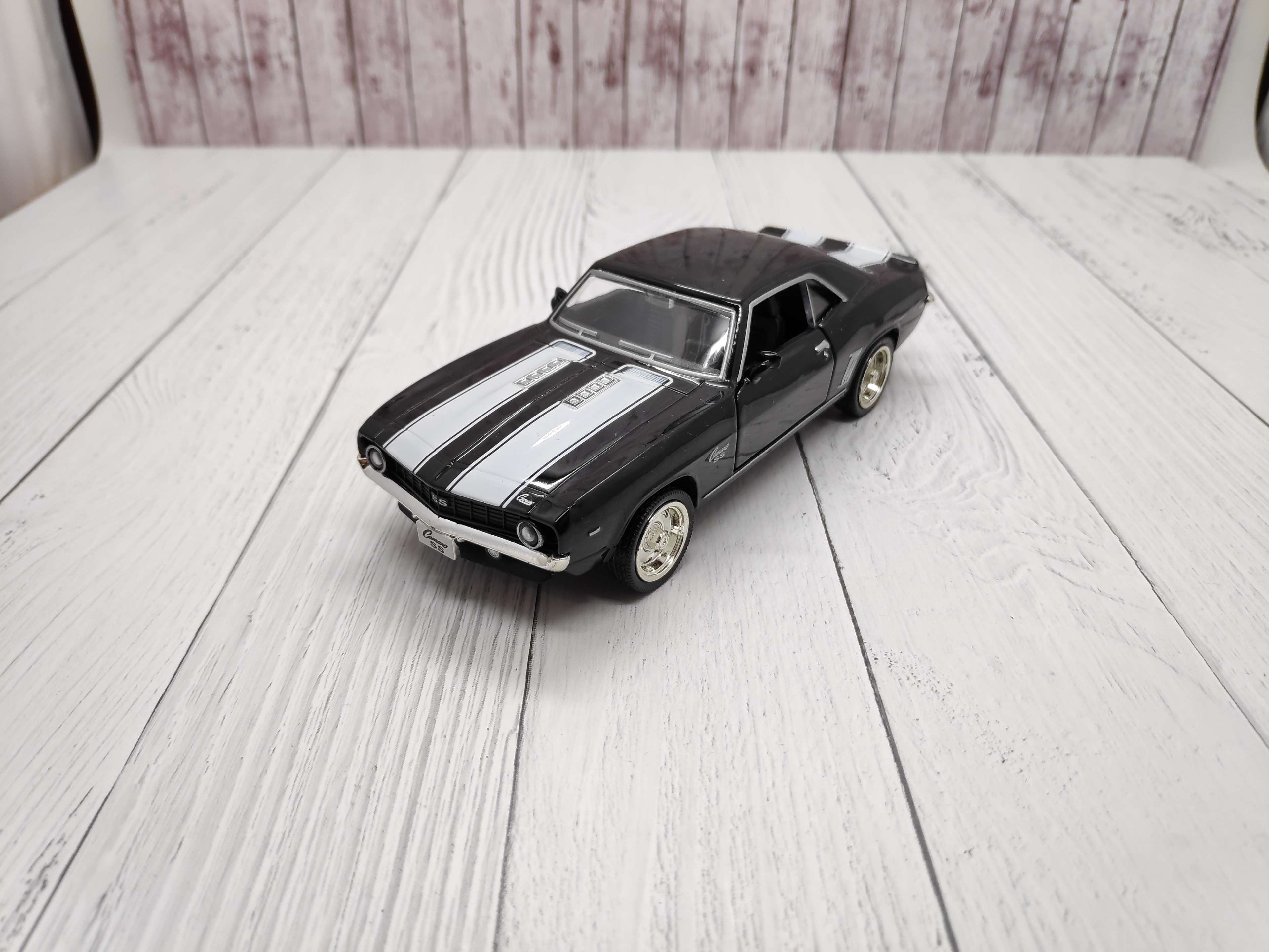 Фотография покупателя товара Машина металлическая CHEVROLET CAMARO SS, 1:32, открываются двери, инерция, цвет матовый - Фото 1