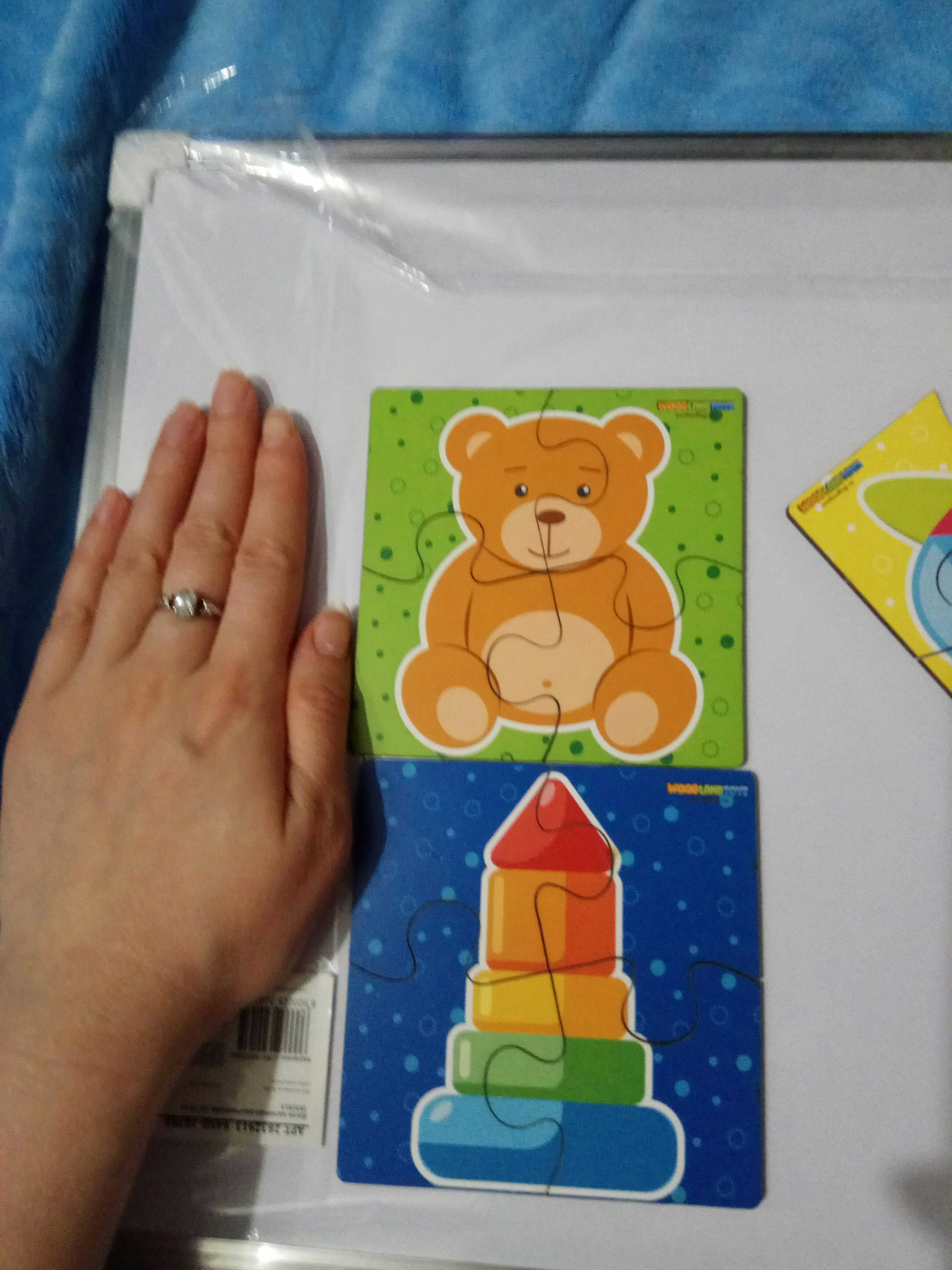 Фотография покупателя товара Набор пазлов для малышей «Игрушки» 4 картинки, размер 1 картинки: 10×10×1,4 см - Фото 2