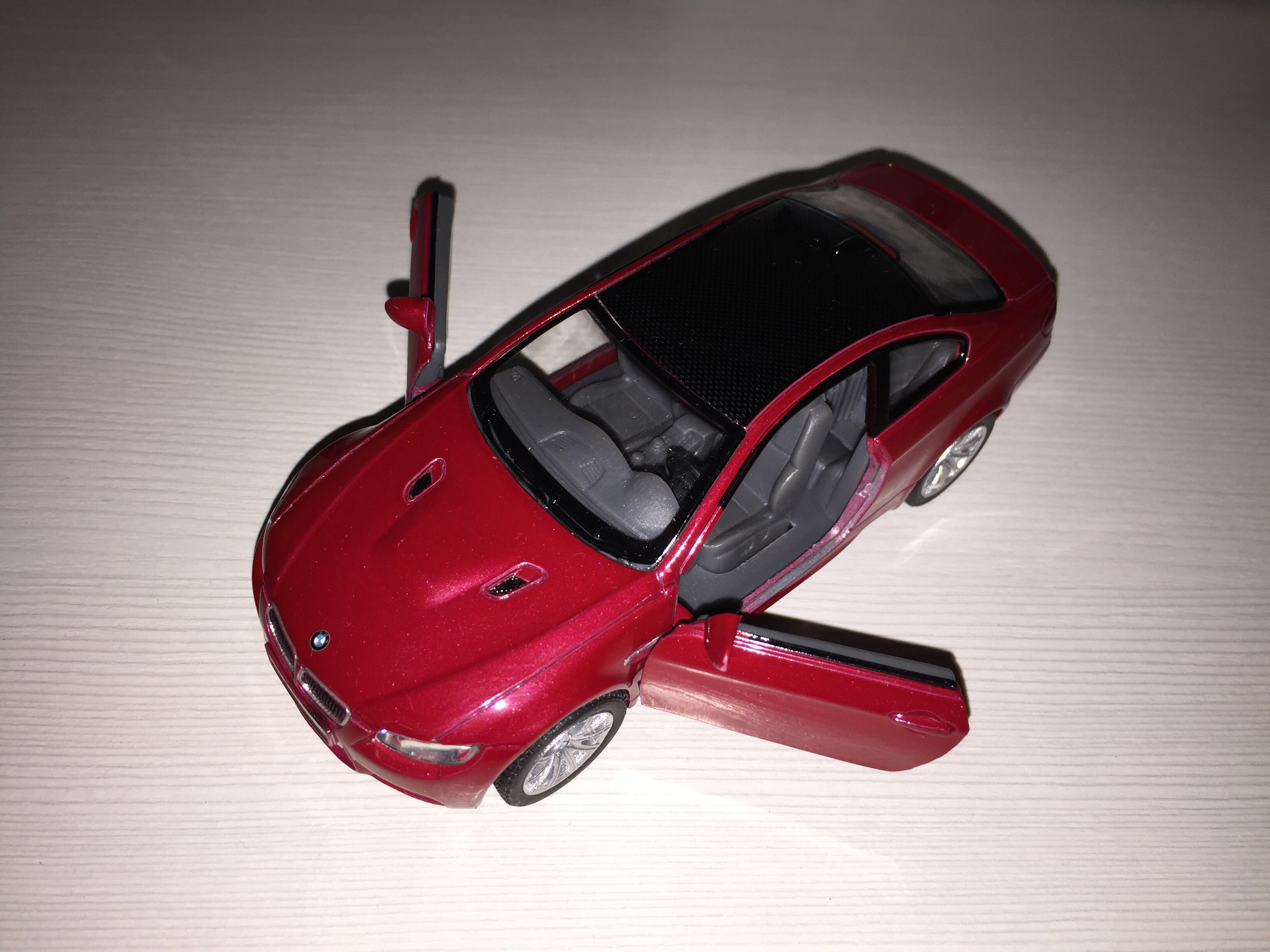 Фотография покупателя товара Машина металлическая BMW M3 Coupe, масштаб 1:36, открываются двери, инерция, цвет красный - Фото 5