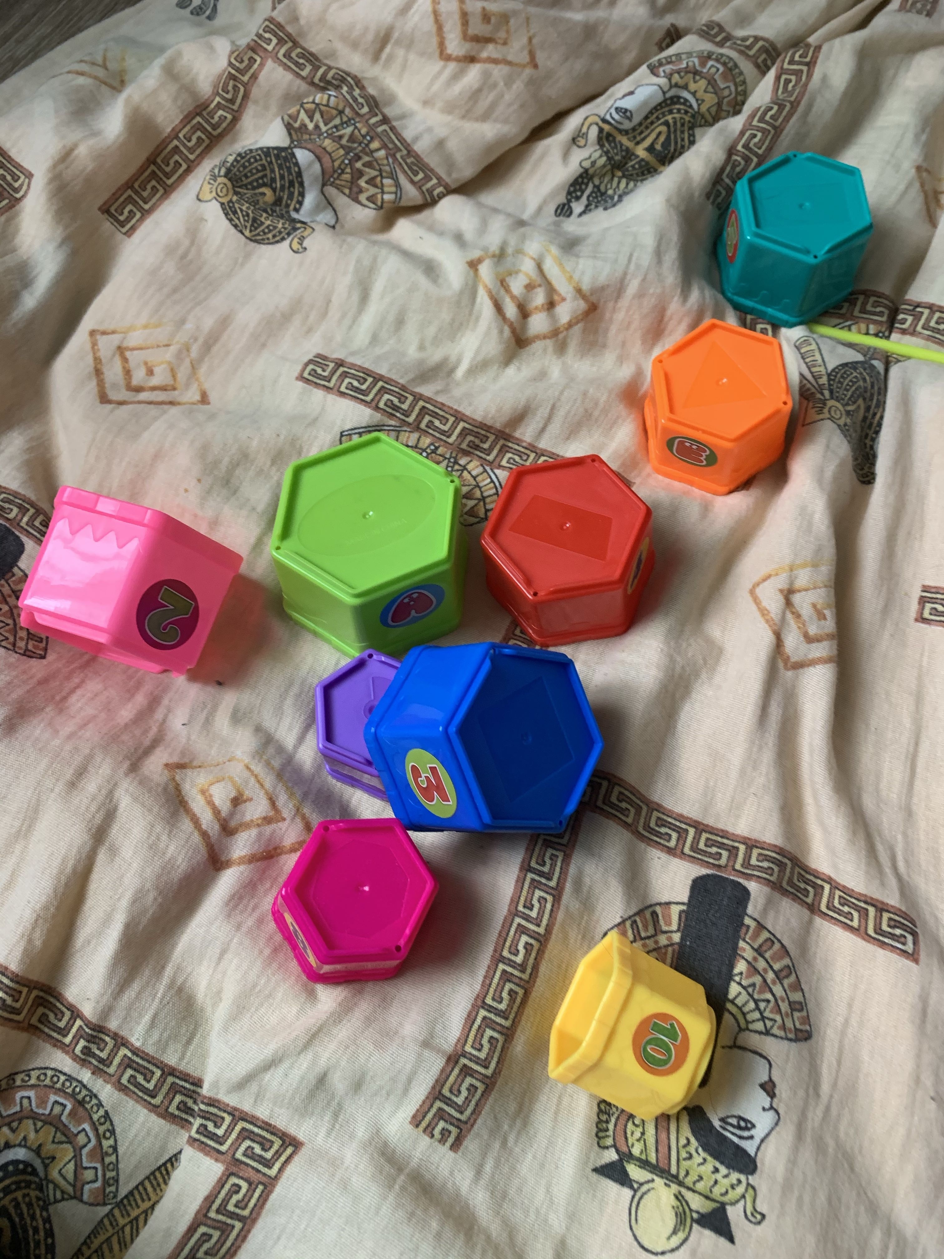 Фотография покупателя товара Игрушка развивающая «Пирамидка-стаканчики: Цифры и буквы», 11 предметов