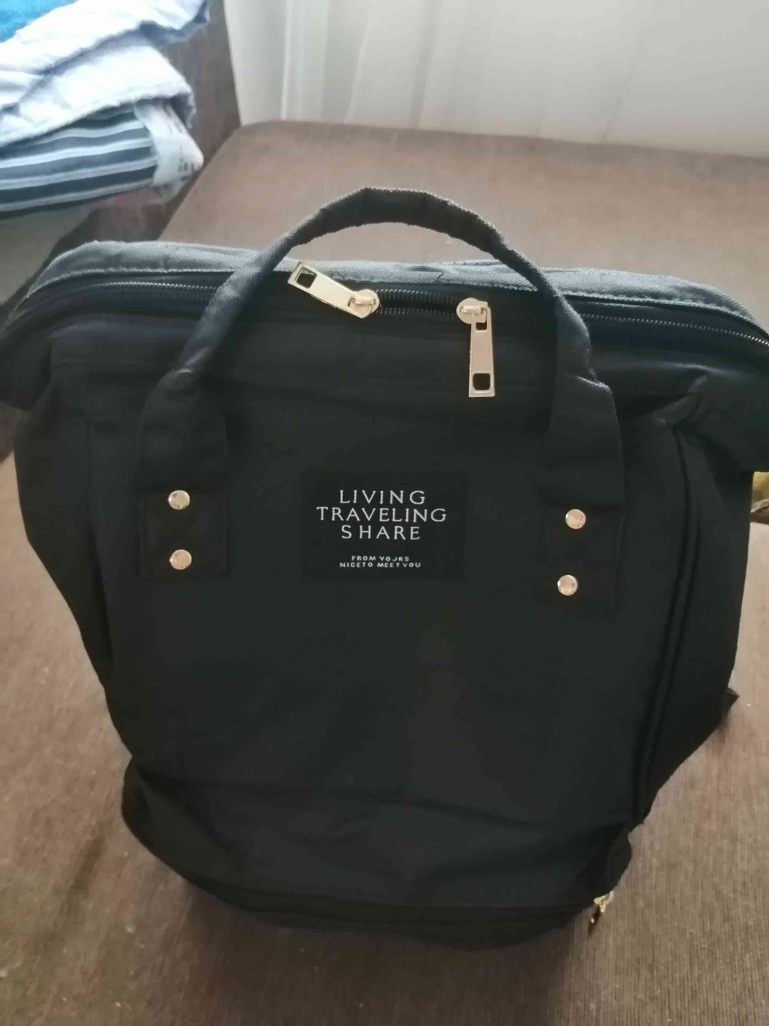 Фотография покупателя товара Рюкзак-сумка, отдел на молнии, 2 наружных кармана, 2 боковых кармана, цвет чёрный - Фото 1