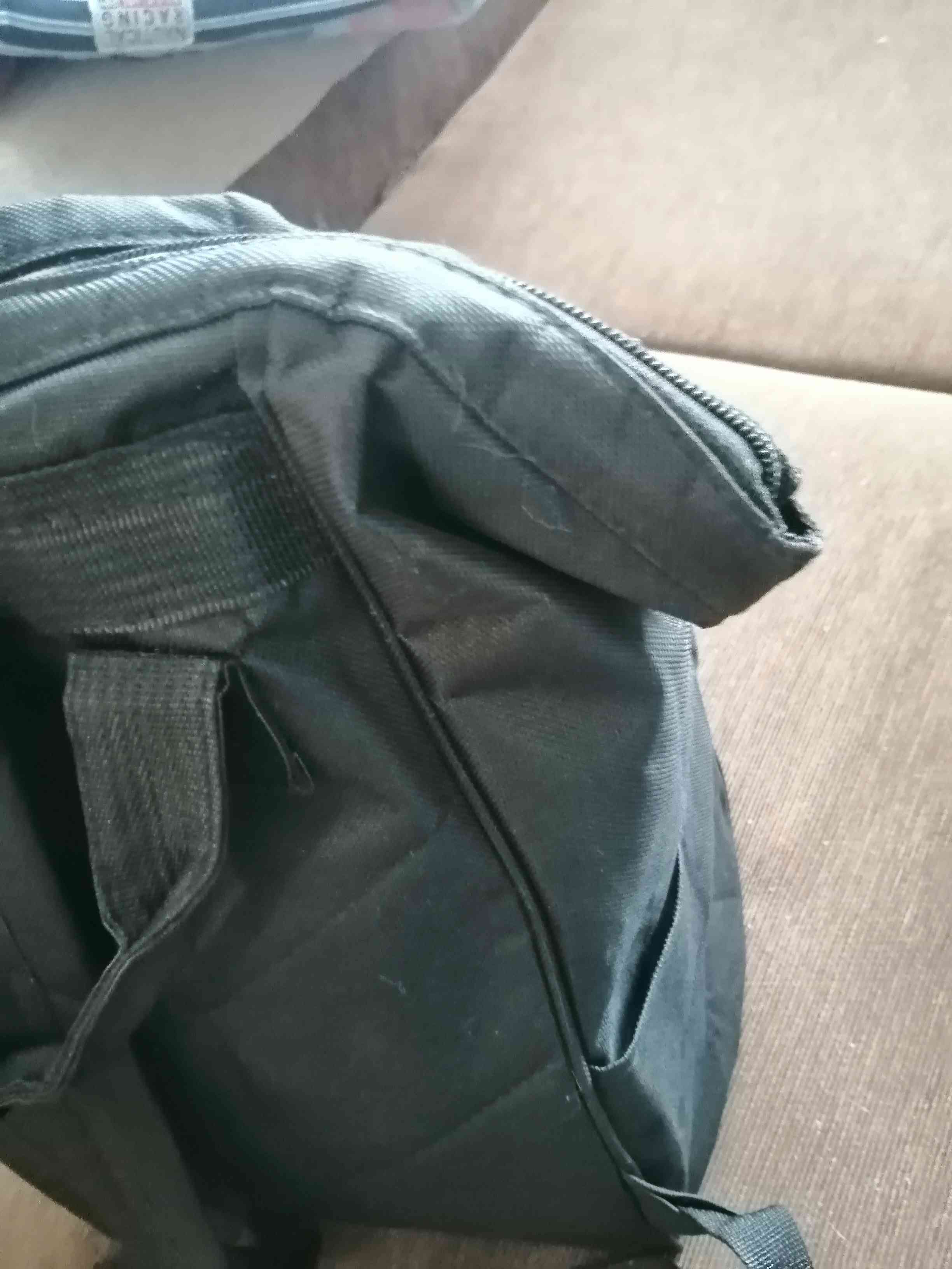 Фотография покупателя товара Рюкзак-сумка, отдел на молнии, 2 наружных кармана, 2 боковых кармана, цвет чёрный - Фото 5