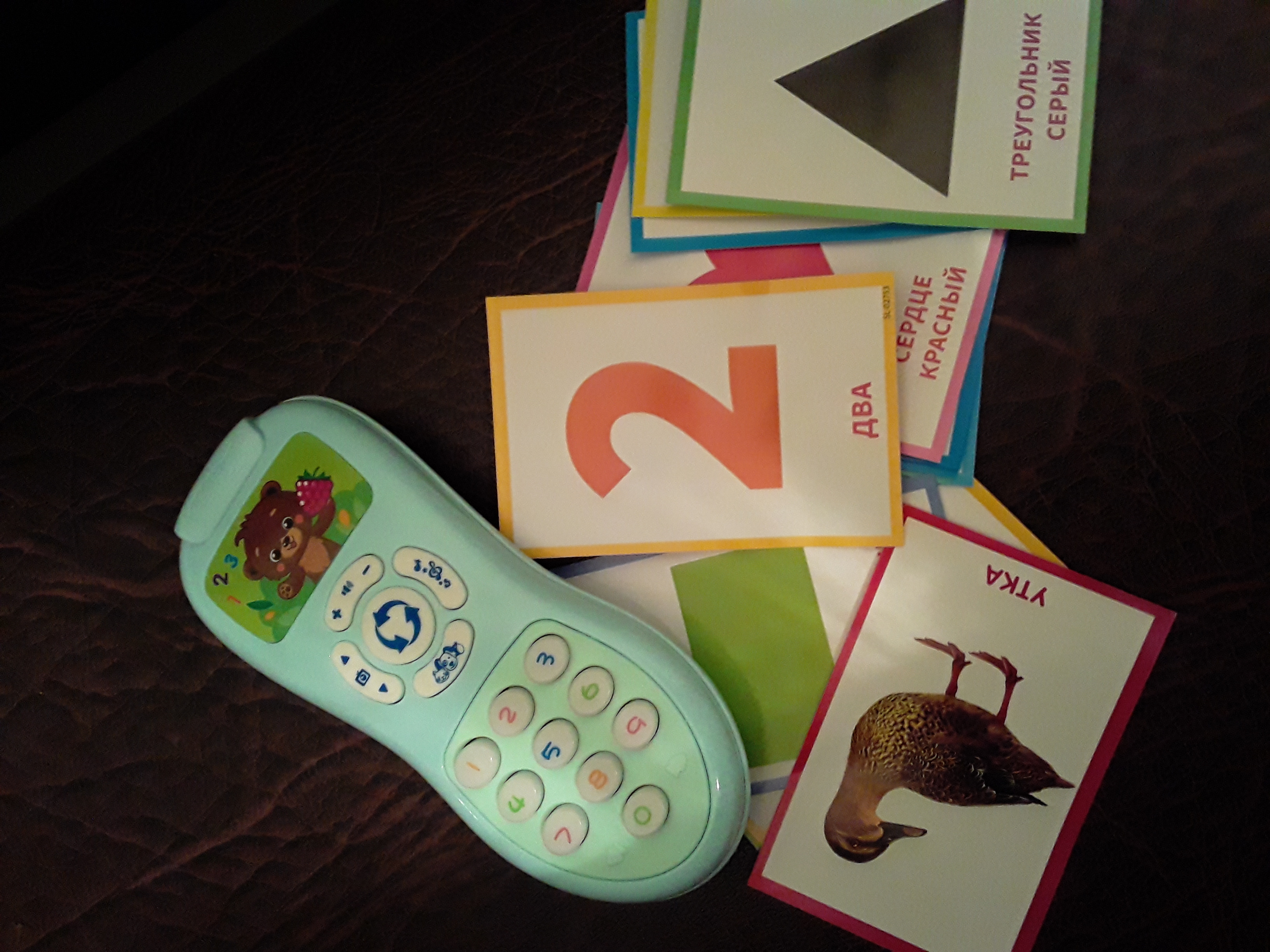 Фотография покупателя товара Обучающая игрушка «Умный пульт», цифры, формы, песни, звуки, цвет голубой - Фото 1
