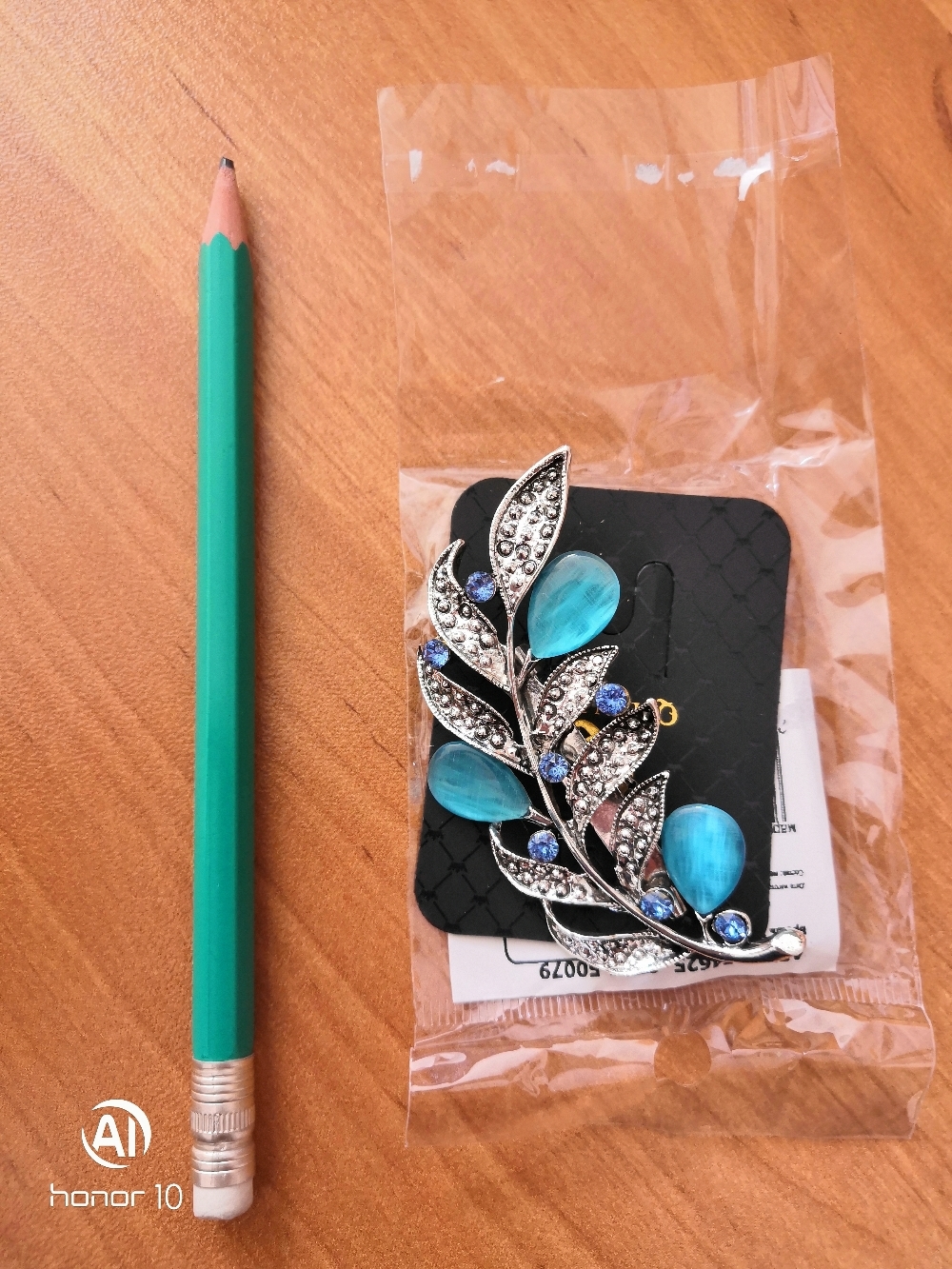 Фотография покупателя товара Брошь "Веточка с листочками", цвет голубой в чернёном серебре