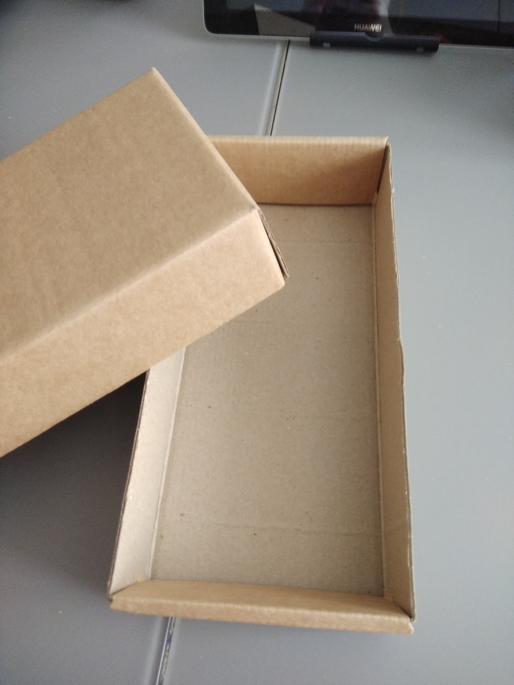 Фотография покупателя товара Коробка сборная без печати крышка-дно бурая без окна 24 х 11,5 х 4,5 см