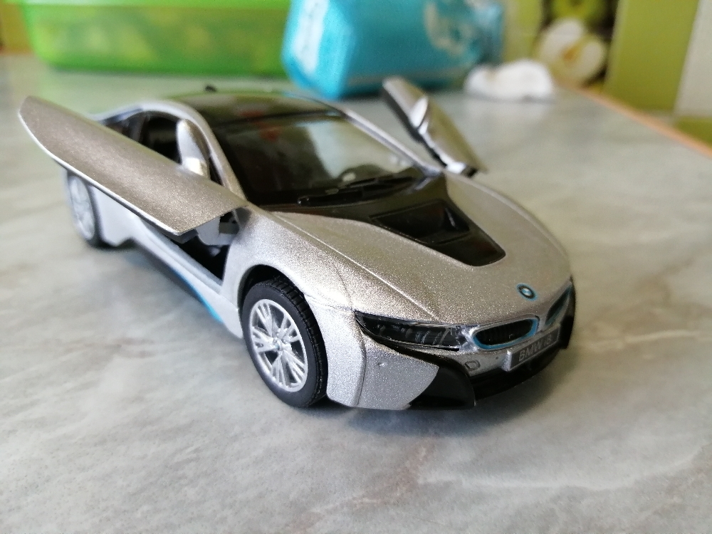 Фотография покупателя товара Машина металлическая BMW i8, 1:36, открываются двери, инерция, МИКС