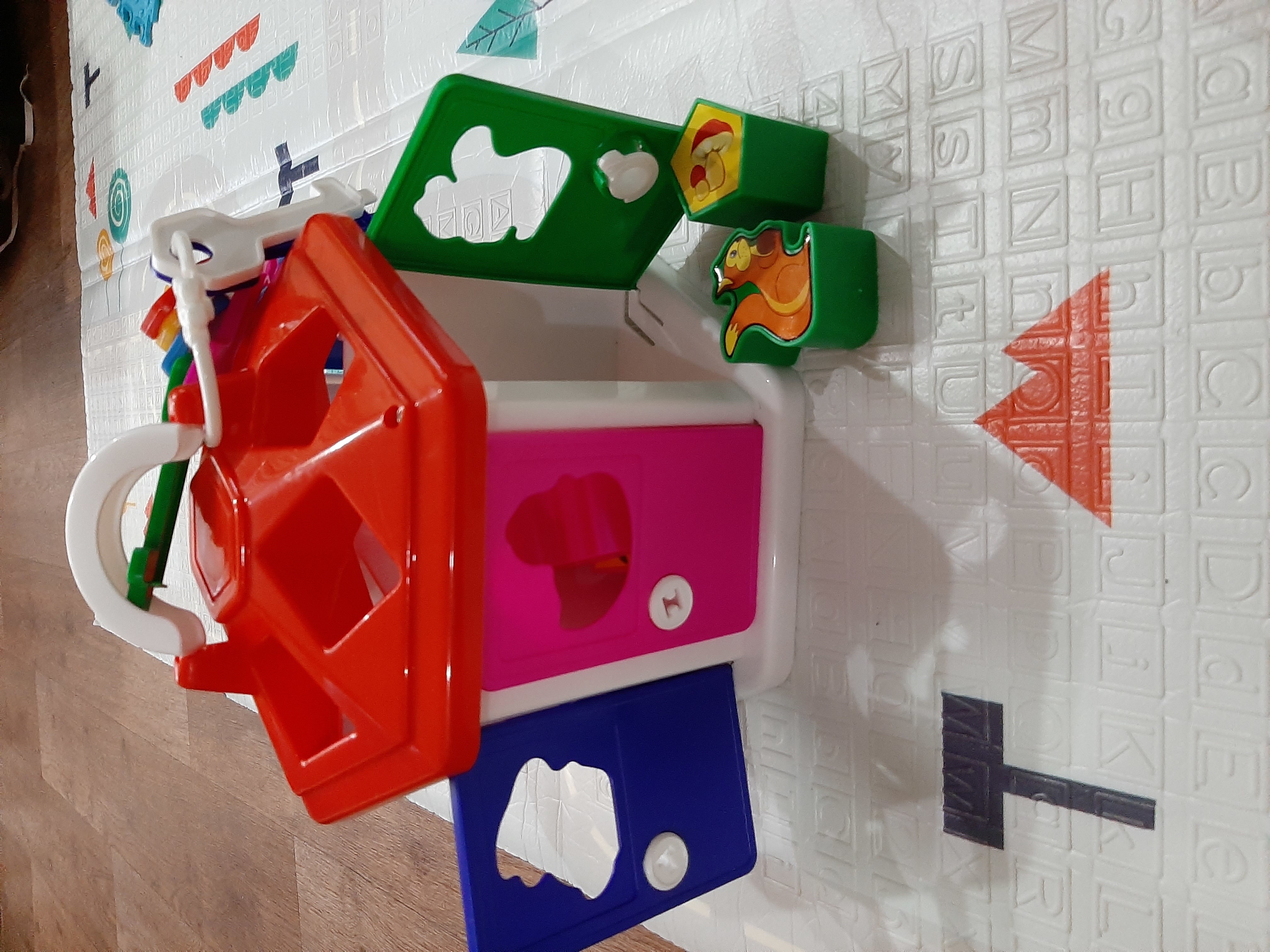 Фотография покупателя товара Развивающая игрушка «Логический домик», с сортером