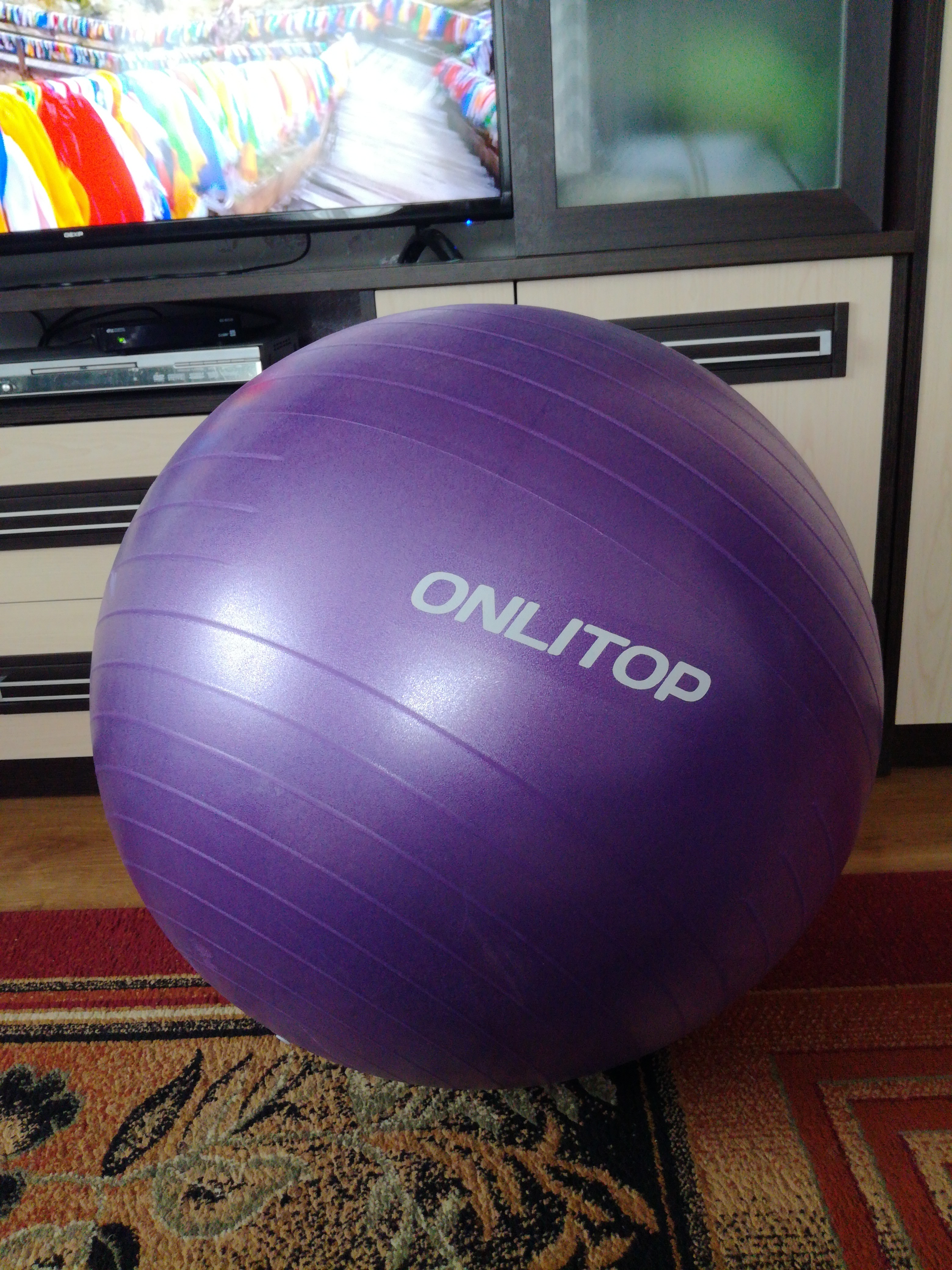 Фотография покупателя товара Фитбол ONLYTOP, d=75 см, 1000 г, антивзрыв, цвет фиолетовый - Фото 1