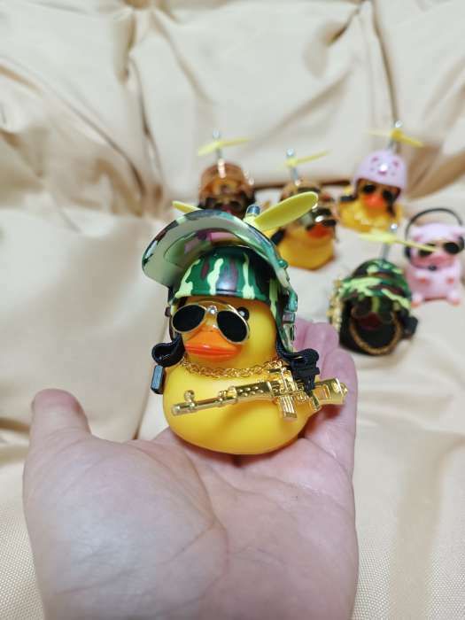 Фотография покупателя товара Игрушка на панель автомобиля «Утка в шлеме хаки» жёлтая - Фото 2