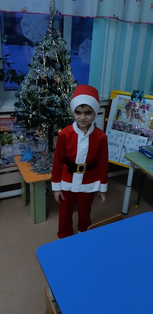 Фотография покупателя товара Детский карнавальный костюм "Санта-Клаус", колпак, куртка, штаны, борода, р-р 30, рост 110-116 см