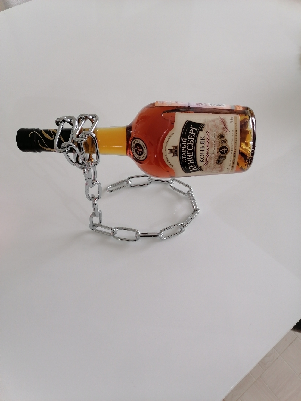 Фотография покупателя товара Подставка для бутылки Доляна «Цепь», 18×12×20 см, цвет хром - Фото 4