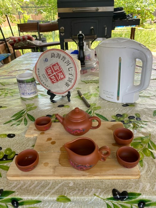 Фотография покупателя товара Набор для чайной церемонии керамический «Дракон», 10 предметов: 8 пиал 35 мл, чайник 200 мл, чахай 150 мл, цвет коричневый - Фото 1