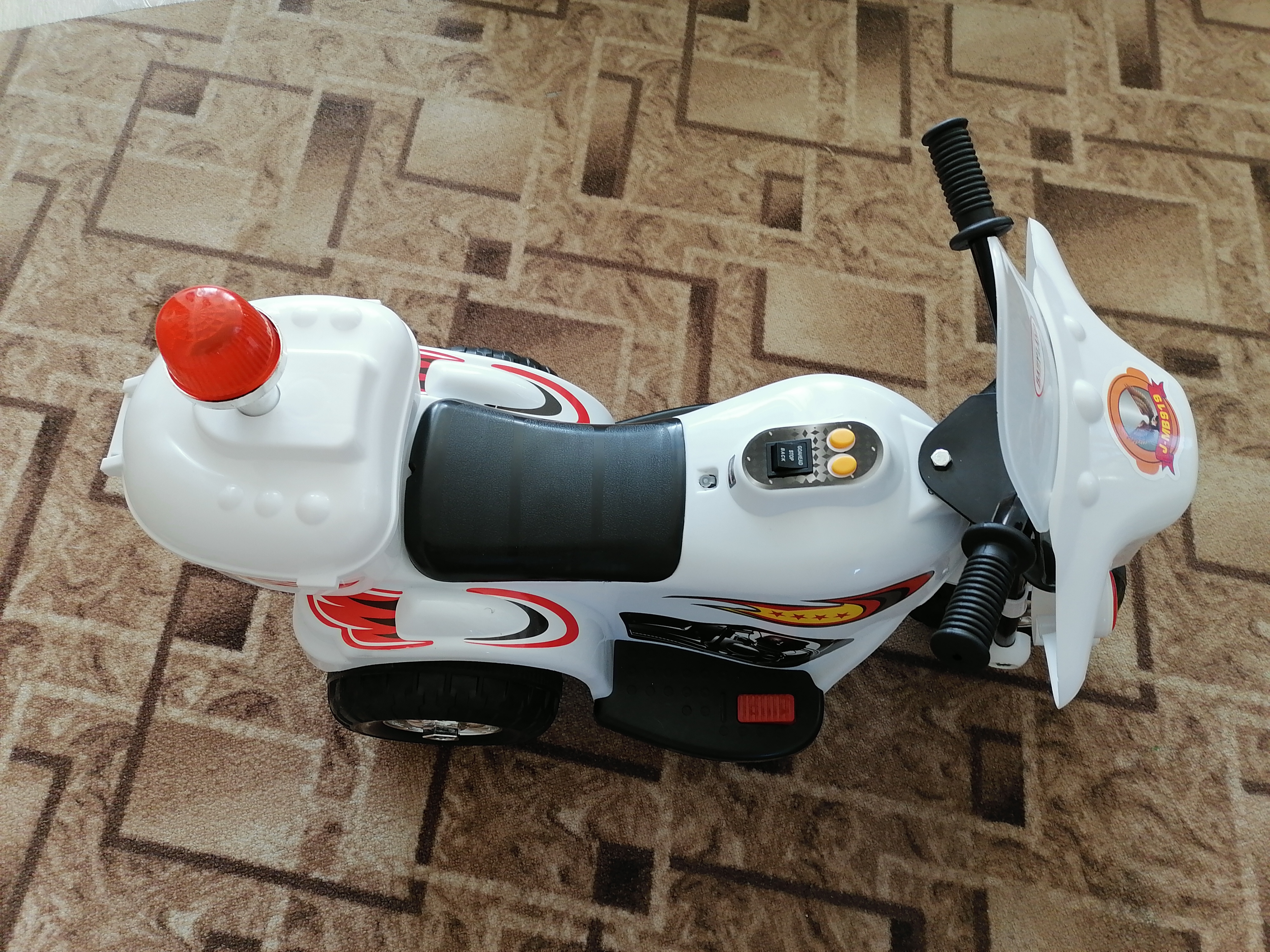 Фотография покупателя товара Электромобиль «Мотоцикл шерифа», цвета МИКС