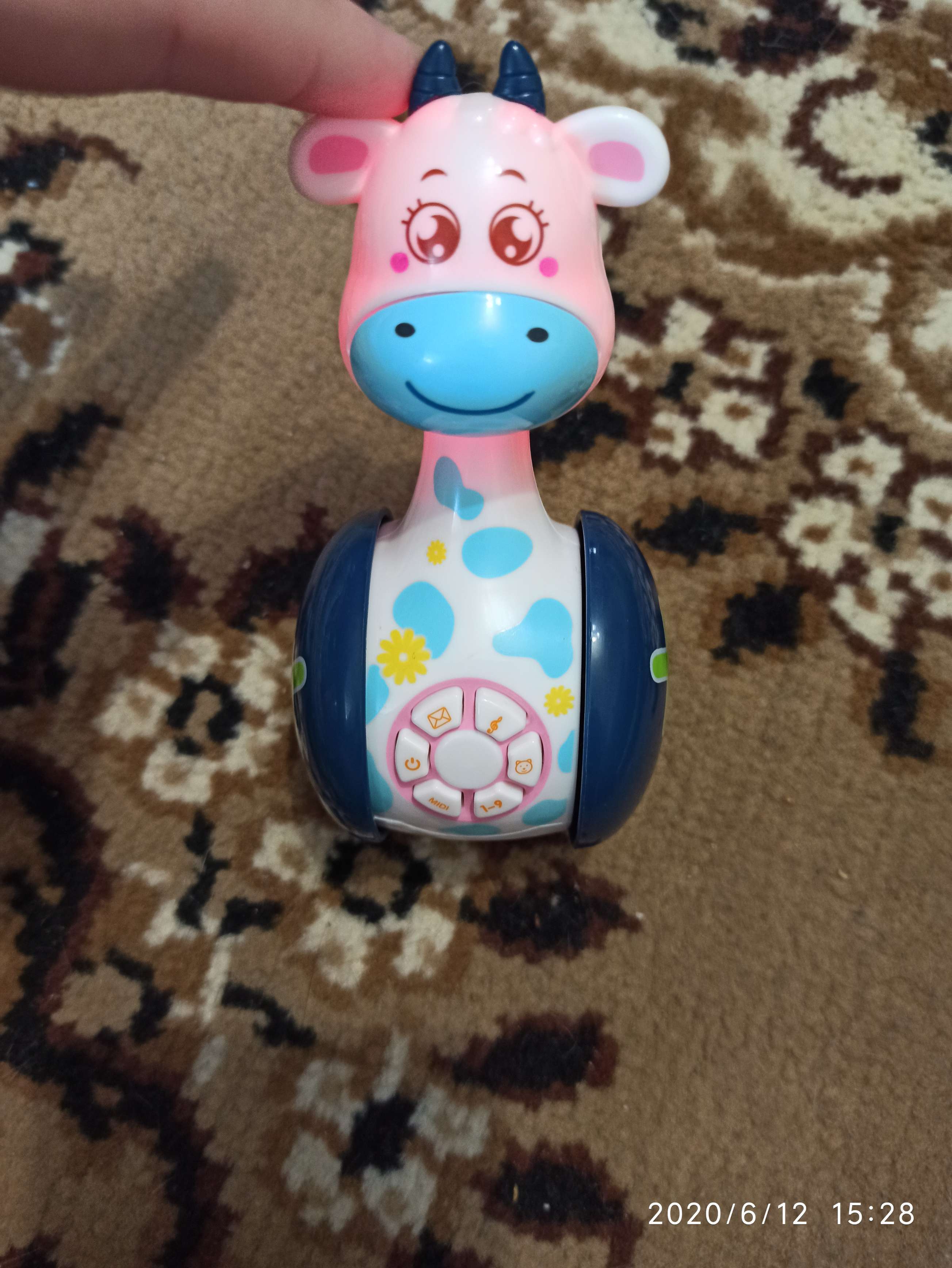 Фотография покупателя товара Развивающая игрушка «Музыкальная неваляшка: Коровка Муму», звук, свет