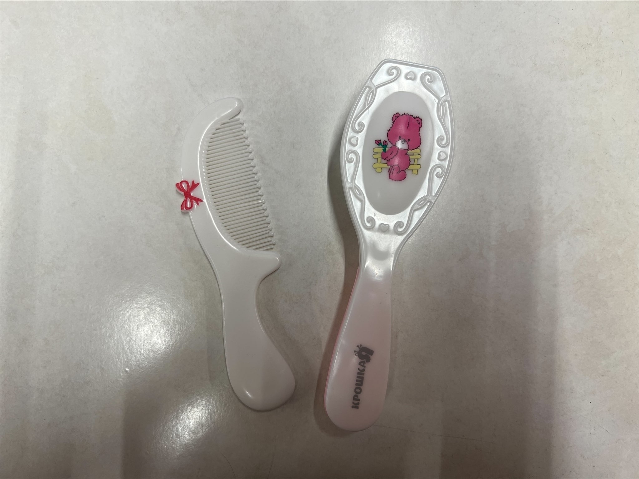 Фотография покупателя товара Расчёска детская + массажная щётка для волос в наборе «Мишка», от 0 мес., цвета рукоятки МИКС