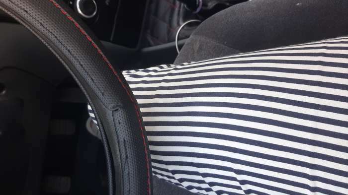 Фотография покупателя товара Оплетка на руль TORSO, кожа PU, перфорация, размер 38 см, красная строчка, черный - Фото 2