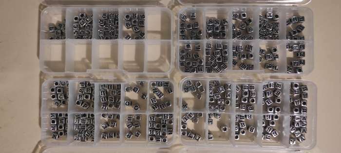 Фотография покупателя товара Бусины для творчества пластик "Русские буквы на кубике" серебро набор 20 гр 0,6х0,6 см