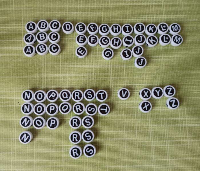 Фотография покупателя товара Бусины для творчества пластик "Англ.буквы в круге" белые на чёрном набор 20 гр 0,6х1х1 см - Фото 2