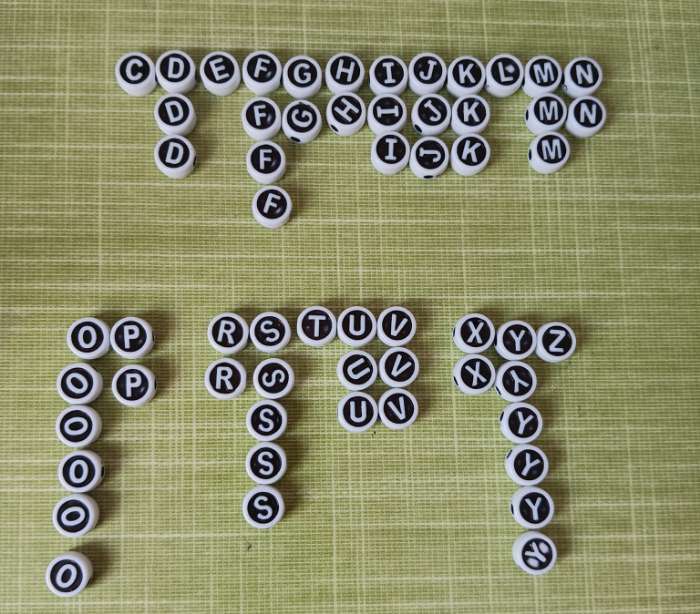 Фотография покупателя товара Бусины для творчества пластик "Англ.буквы в круге" белые на чёрном набор 20 гр 0,6х1х1 см - Фото 3
