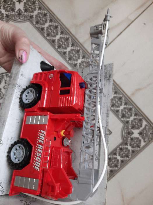 Фотография покупателя товара Машина инерционная «Пожарная», стреляет водой, 1:20 - Фото 1