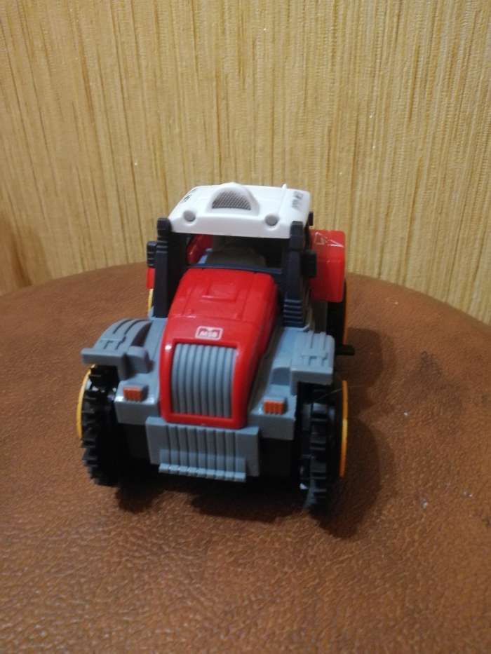 Фотография покупателя товара Трактор-перёвертыш «Хозяин фермы», работает от батареек, цвет красный - Фото 16