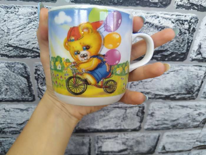 Фотография покупателя товара Набор детской посуды из керамики Доляна «Мишка на велосипеде», 3 предмета: кружка 230 мл, миска 400 мл, тарелка d=18 см