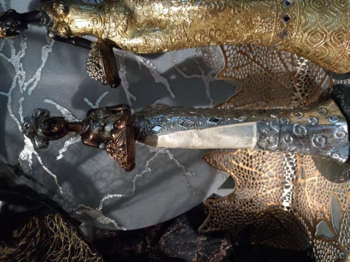 Фотография покупателя товара Сувенир полистоун "Африканка в серебр.платье с перламутром с тарелкой фруктов" 32х7х9,5 см - Фото 5