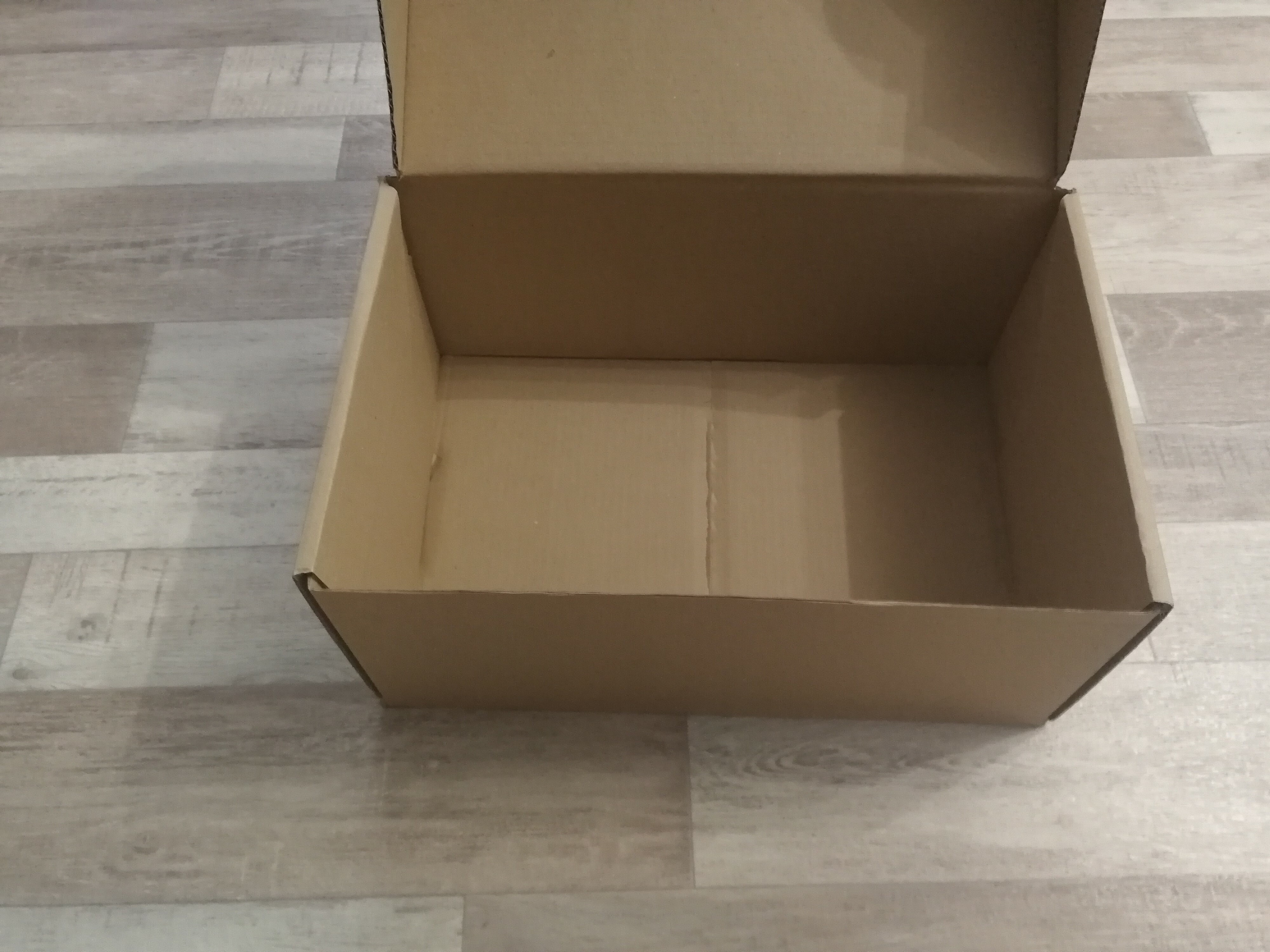 Фотография покупателя товара Коробка самосборная "Почтовая", бурая, 40 х 27 х 18 см - Фото 2