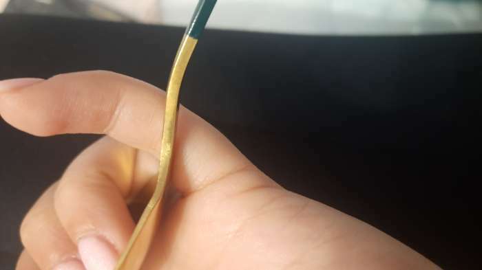 Фотография покупателя товара Ложка столовая из нержавеющей стали Magistro «Блинк», 22×4 см, на подвесе, цвет золотой, зеленая ручка - Фото 2