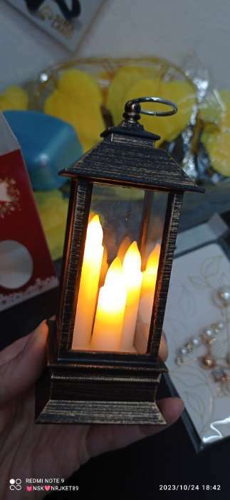 Фотография покупателя товара Светодиодная фигура «Золотистый фонарь со свечками» 5.5 × 13 × 5.5 см, пластик, батарейки AG13х3, свечение тёплое белое - Фото 6