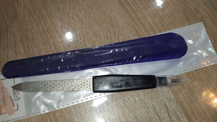 Фотография покупателя товара Пилка-триммер металлическая для ногтей, перфорированная, с защитным колпачком, 15 см, в чехле, цвет чёрный - Фото 2