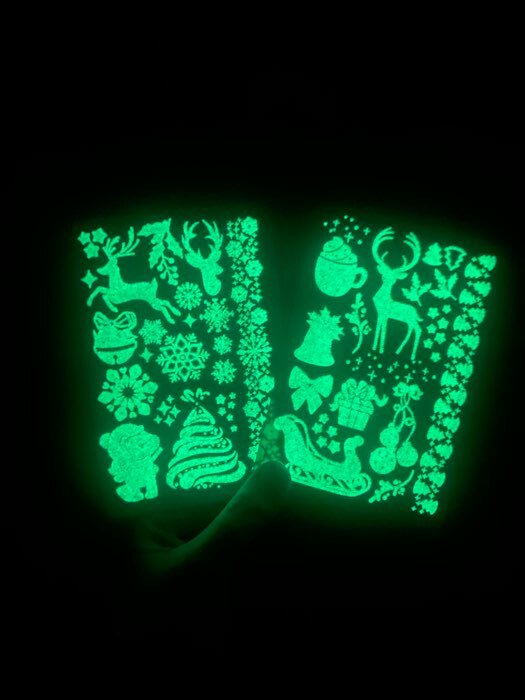 Фотография покупателя товара Новогодние тату светятся в темноте, 2 листа в наборе - Фото 2