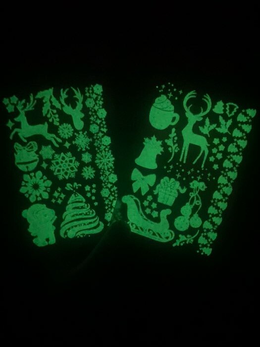Фотография покупателя товара Новогодние тату светятся в темноте, 2 листа в наборе - Фото 1