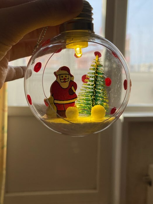 Фотография покупателя товара Ёлочный шар «Ангелочки», d=8 см, 1 LED, от батареек, свечение тёплое белое - Фото 3