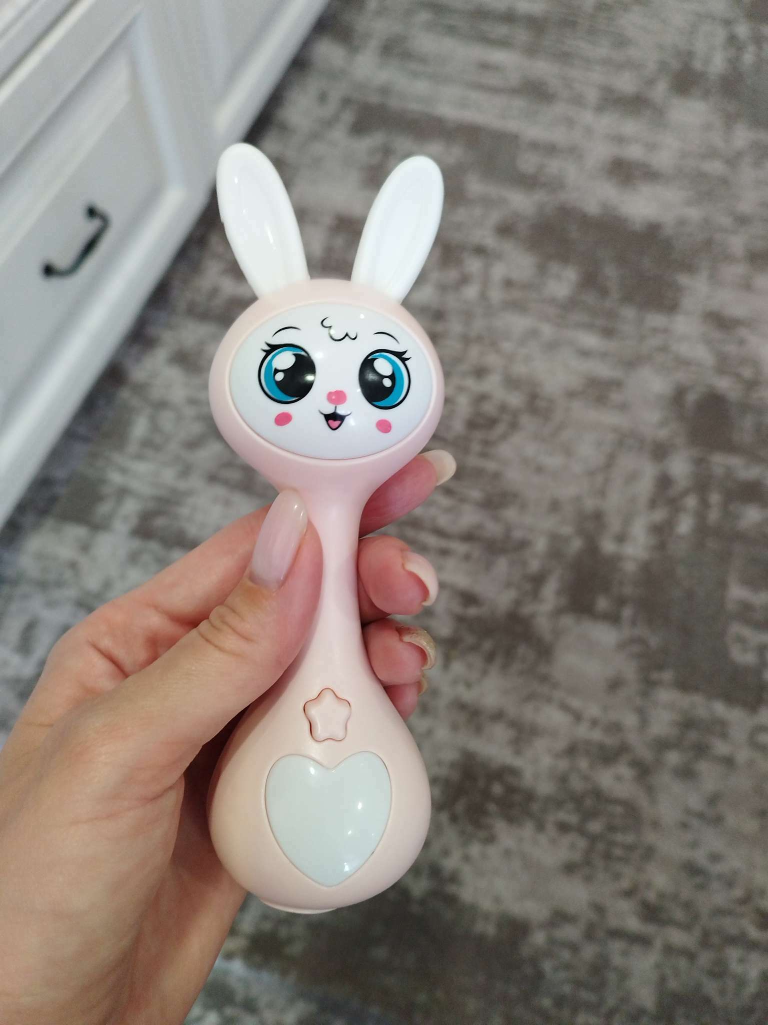 Фотография покупателя товара Музыкальная игрушка «Любимый зайчик», звук, свет, цвет розовый