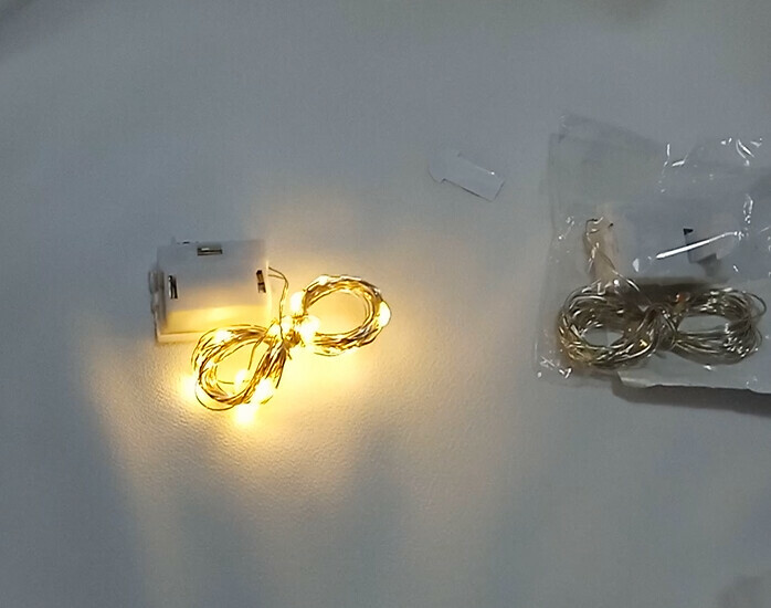 Фотография покупателя товара Гирлянда «Нить» 2 м роса, IP20, серебристая нить, 20 LED, свечение тёплое белое, 3 режима, AG13х3