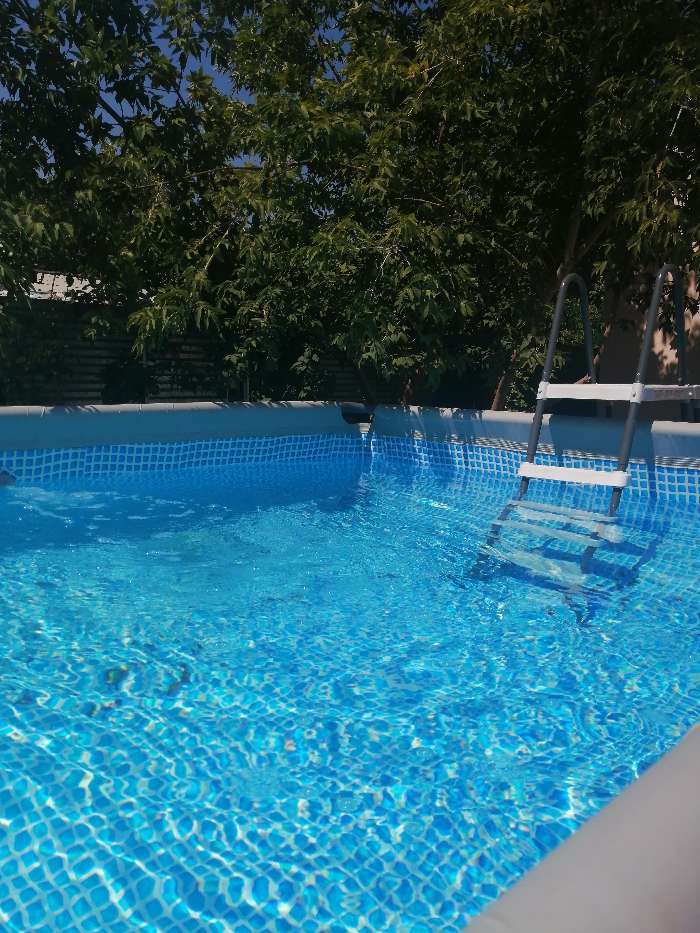 Фотография покупателя товара Бассейн каркасный Ultra XTR Frame, 549×274×132 см, песчаный фильтр-насос, лестница, тент, подстилка, 26356NP INTEX - Фото 4