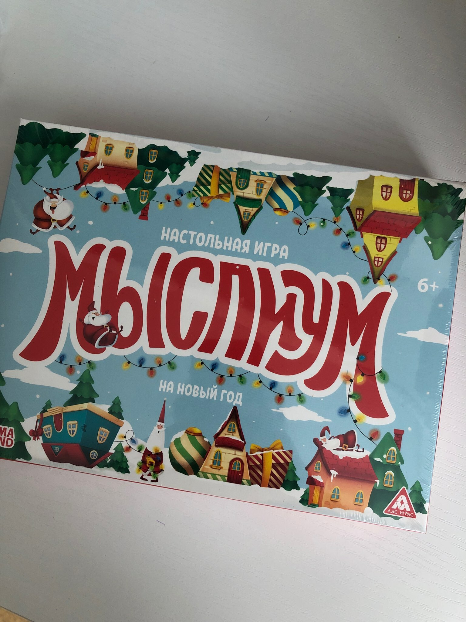 Фотография покупателя товара Новогодняя настольная игра «Мыслиум. На Новый год», кубик, фишки, 50 карт, 6+ - Фото 2