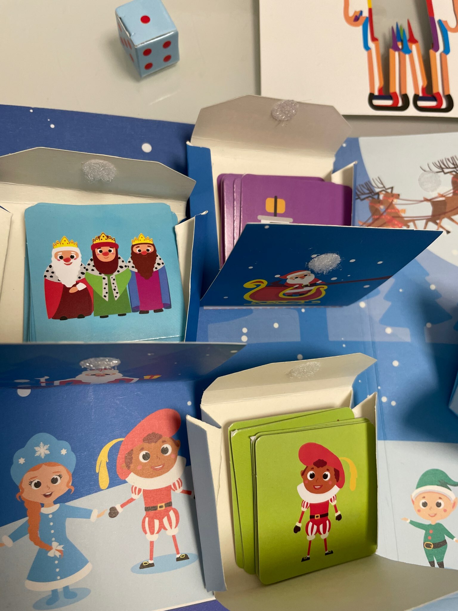 Фотография покупателя товара Новогодняя интерактивная игра-лэпбук «Новый год: Деды Морозы в разных странах», 3+ - Фото 6