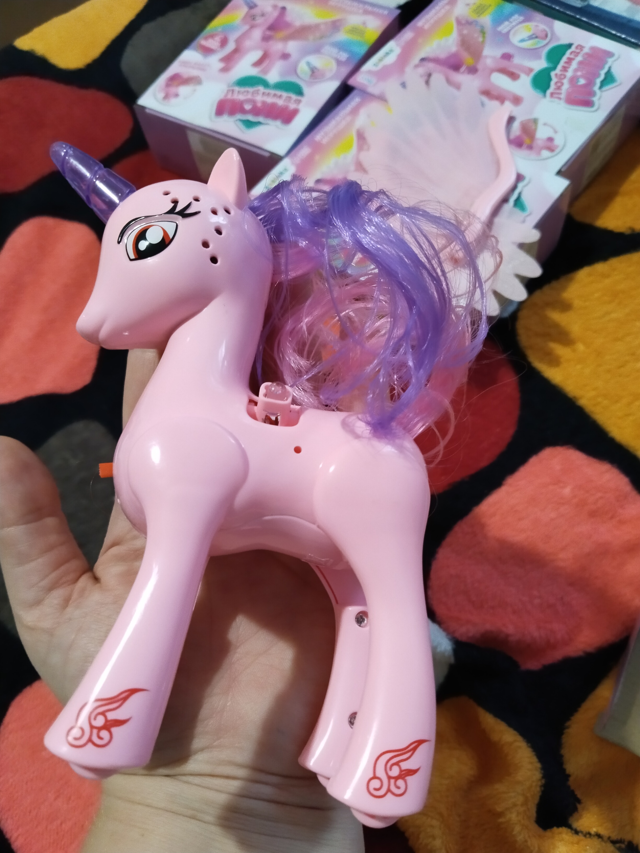 Фотография покупателя товара Музыкальная игрушка «Единорог», со светом и звуком, машет крыльями, цвет розовый - Фото 1