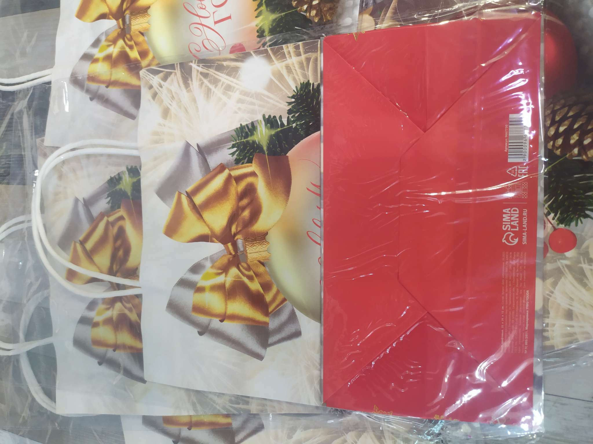 Фотография покупателя товара Пакет подарочный новогодний крафтовый «Волшебного Нового года», 22×12×25 см - Фото 2