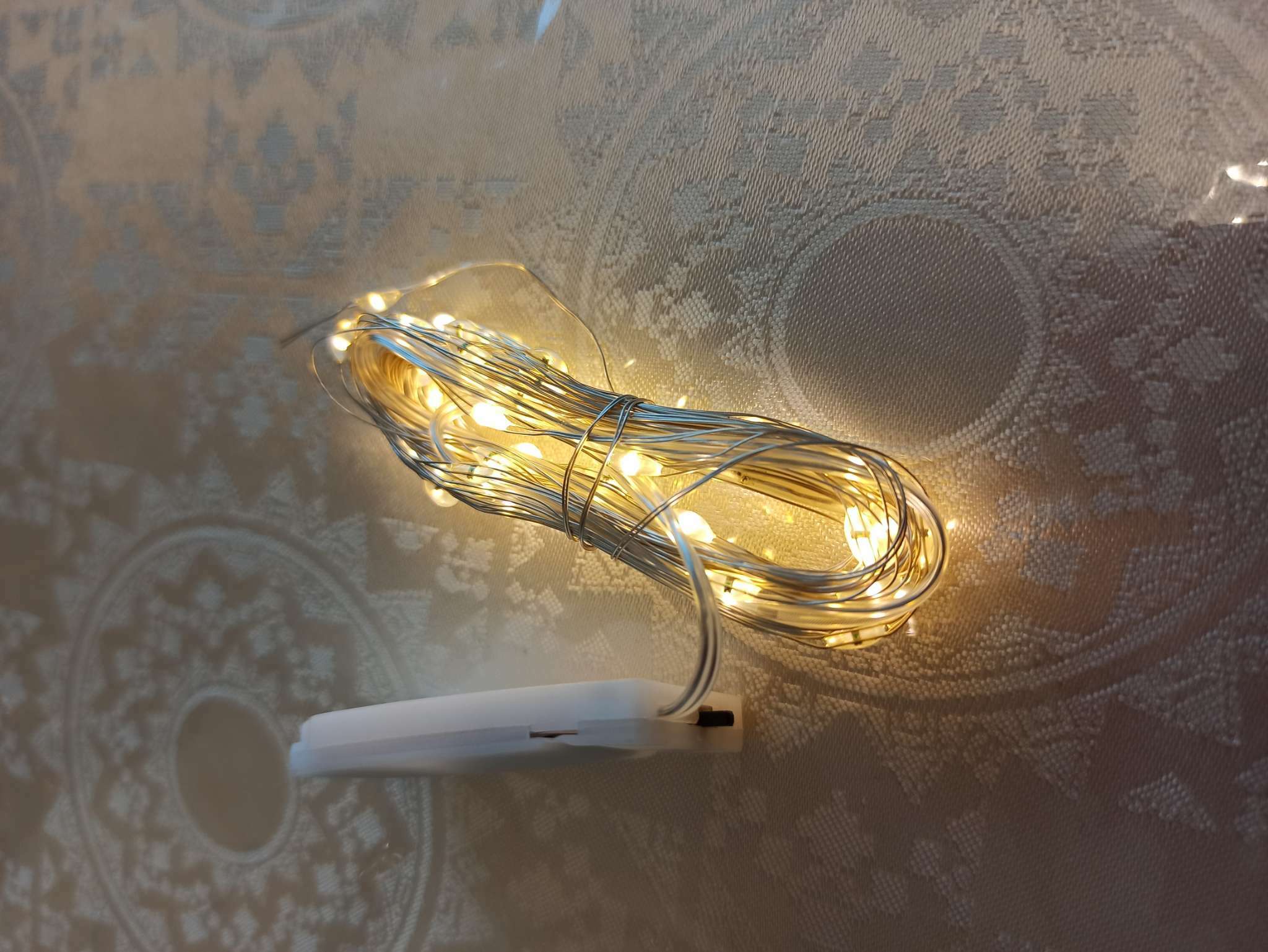 Фотография покупателя товара Гирлянда «Нить» 5 м роса, IP20, серебристая нить, 50 LED, свечение тёплое белое, CR2032х2 - Фото 5
