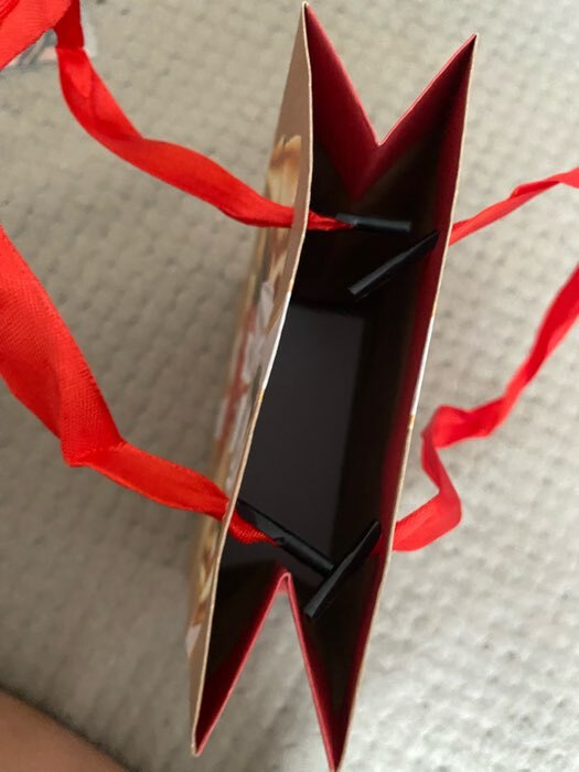 Фотография покупателя товара Пакет крафтовый вертикальный «Новогодний подарок», S 12 × 15 × 5.5 см
