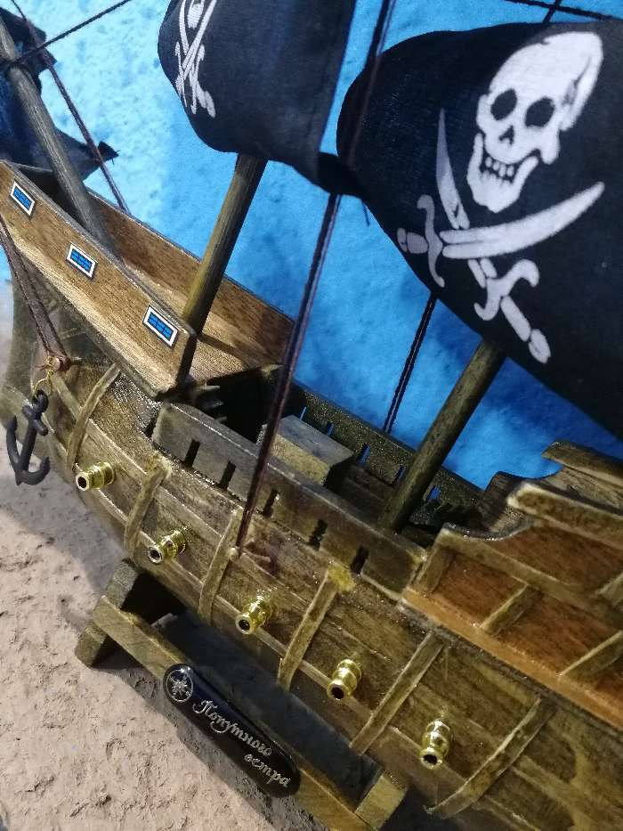 Фотография покупателя товара Корабль сувенирный средний «Каймон», светлое дерево, паруса чёрные пиратские, 33х8х29 см - Фото 1